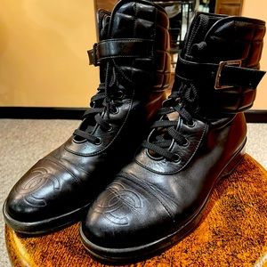 Black CHANEL leather boots.